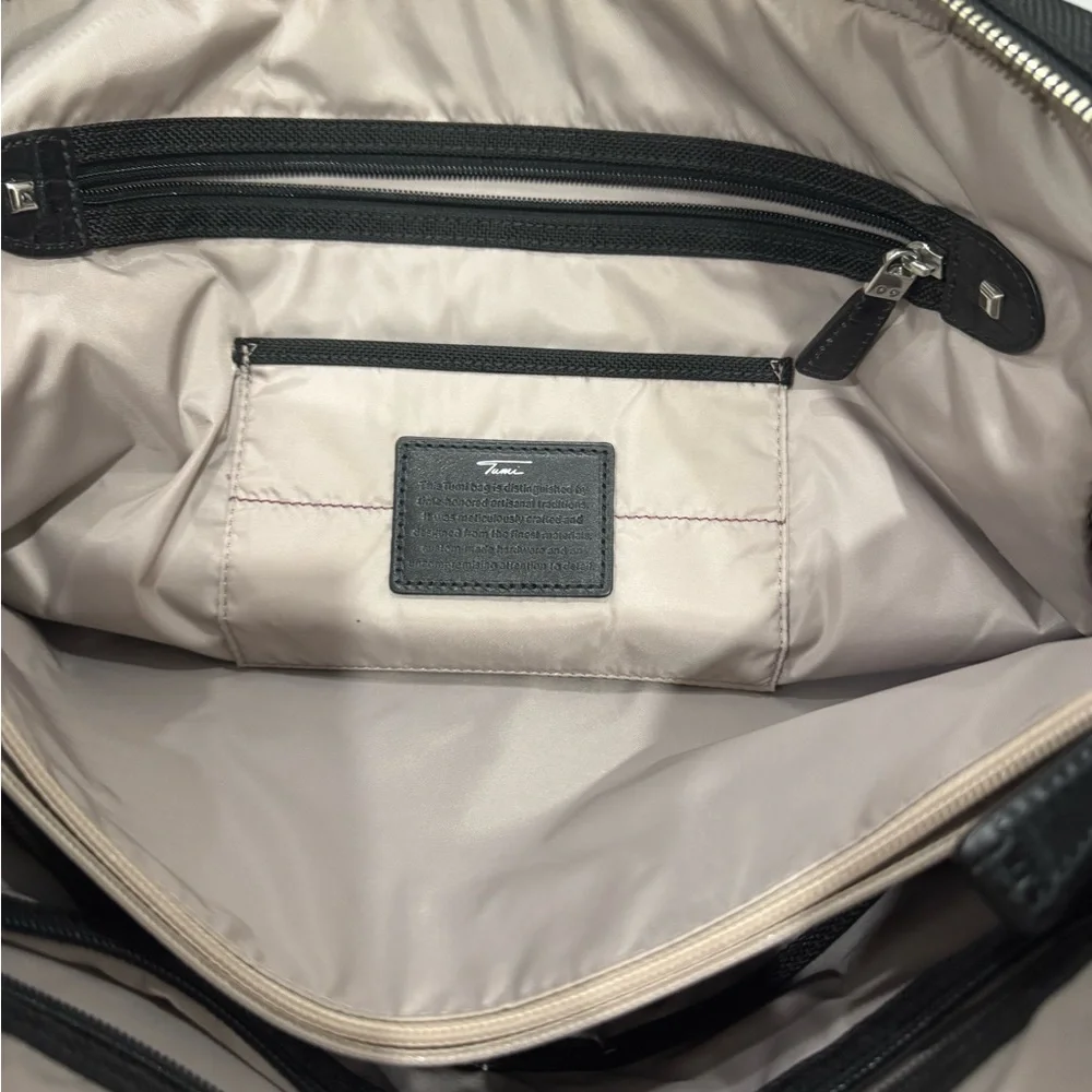 Tumi Travel Black Briefcase with Leather Finish and Metal Accents